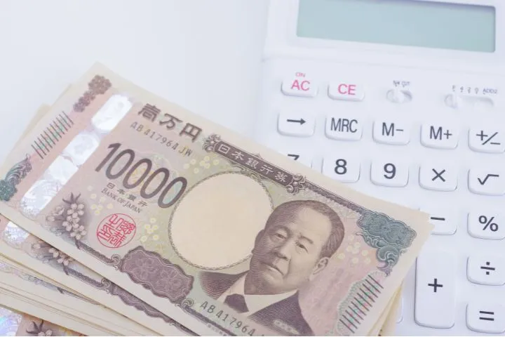 札束と計算機